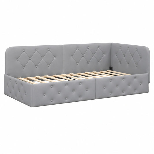Letto angolare imbottito in tessuto grigio chiaro 90x190 cm, design moderno a forma di L con braccioli reversibili