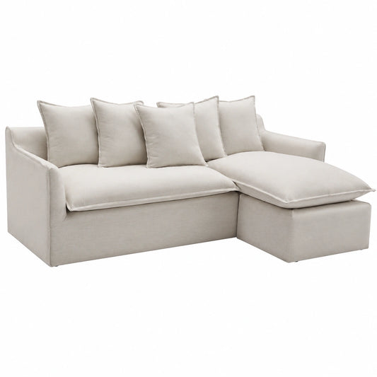 Divano angolare reversibile in tessuto beige con design moderno - Maison Céphy